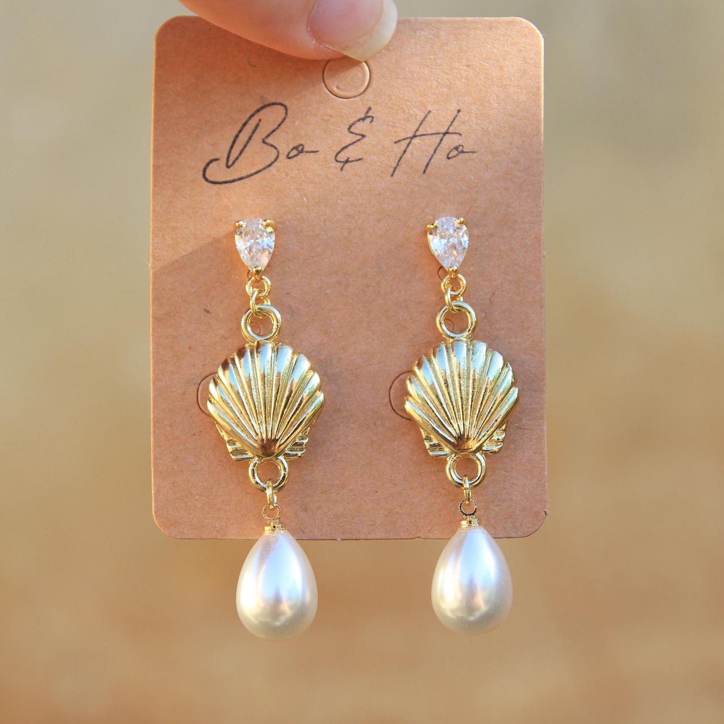 Dangly Gold Shell Pearl Earrings