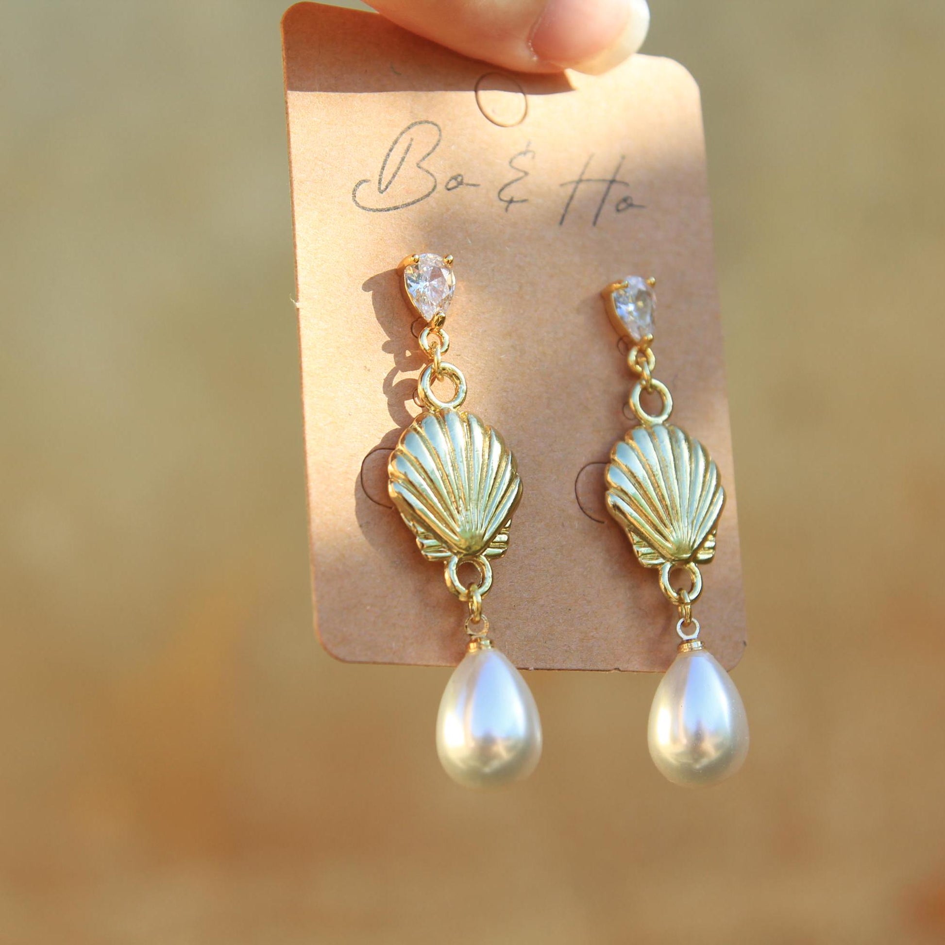 Dangly Gold Shell Pearl Earrings